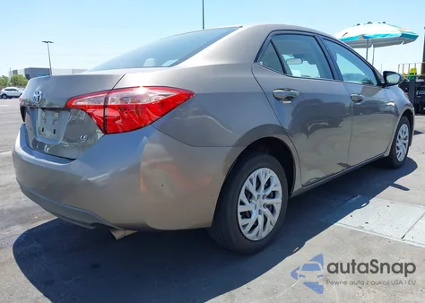 2018 Toyota Corolla Le z USA, uszkodzony, nr VIN 5YFBURHE2JP853055